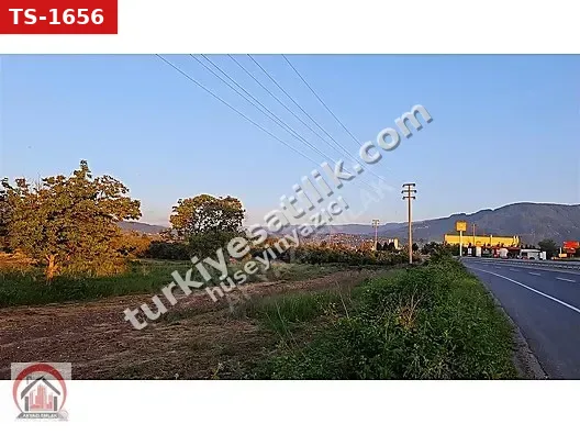 AKYAZI EMLAK'TAN KUZULUK ÇEVRE YOLU ÜZERİNDE SATILIK TARLA